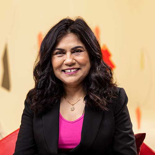 Veena Sahajwalla smiling at the camera